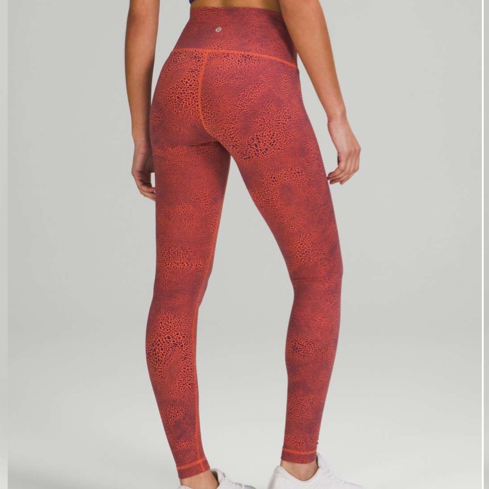Lululemon size 4 Wunder Train High Rise Orange Crackle 23”